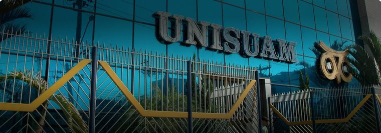 Portão e fachada da unidade Bonsucesso com o logo da UNISUAM